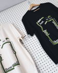 tee, get lost x momos, raw white.