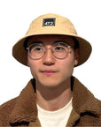 technical adjustable bucket hat, get lost, camel.